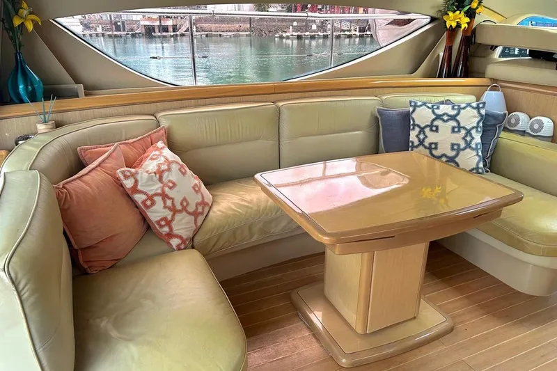  Yacht Photos Pics Luxurious interior of 2008 Fairline Squadron 74 yacht with elegant seating and decorative pillows.