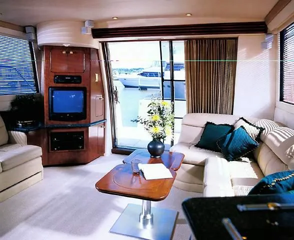 No Worries Yacht Photos Pics Luxurious interior of 2000 Carver 450 Voyager Pilothouse yacht with elegant furnishings.