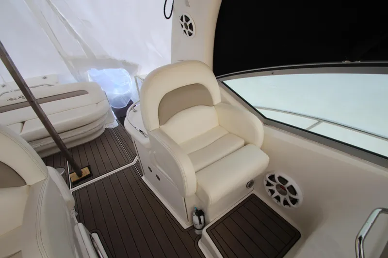  Yacht Photos Pics Luxurious interior of 2005 Sea Ray 340 Sundancer with plush seating and elegant design.