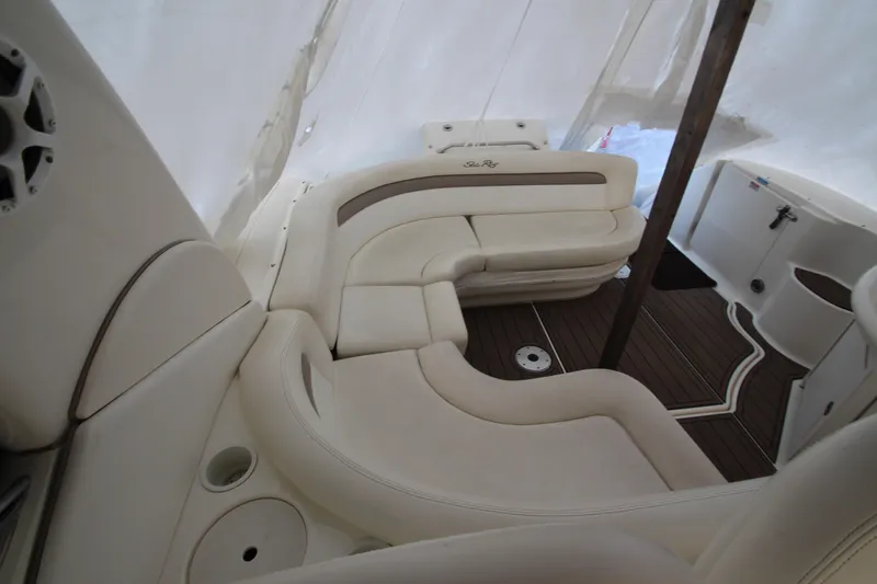  Yacht Photos Pics 2005 Sea Ray 340 Sundancer interior with cream leather seating and wood flooring.