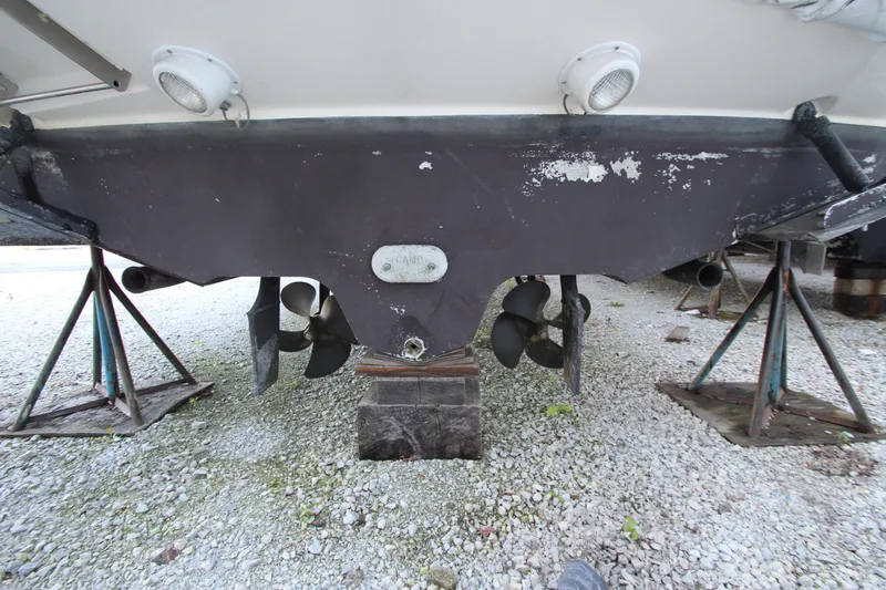  Yacht Photos Pics 2005 Sea Ray 340 Sundancer boat hull and propellers on stands.