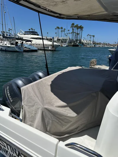 Destination Unknown II Yacht Photos Pics 2021 Jeanneau NC 895 boat docked in a marina with Yamaha engines.