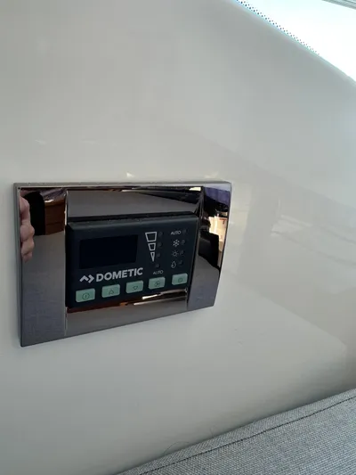 Destination Unknown II Yacht Photos Pics Dometic control panel on 2021 Jeanneau NC 895 boat interior.