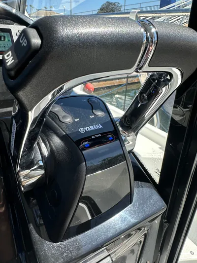 Destination Unknown II Yacht Photos Pics Throttle control of a 2021 Jeanneau NC 895 boat with Yamaha branding.