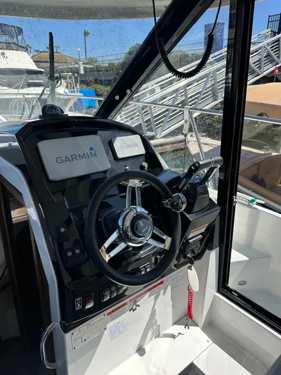 Destination Unknown II Yacht Photos Pics Helm of 2021 Jeanneau NC 895 with Garmin navigation system.