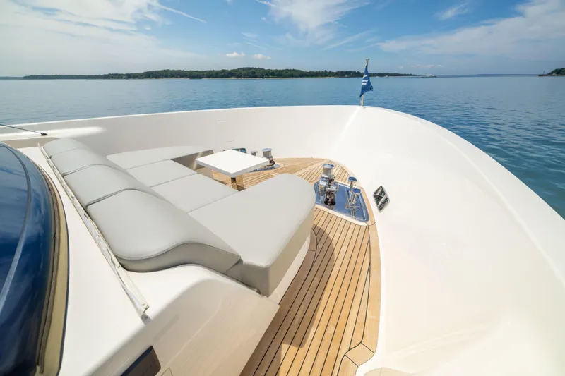 Sori San Lorenzo Yacht Photos Pics Luxurious 2024 Sanlorenzo SL90A yacht deck with sleek seating and ocean view.