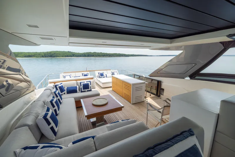 Sori San Lorenzo Yacht Photos Pics Luxurious 2024 Sanlorenzo SL90A yacht interior with elegant seating and scenic ocean view.