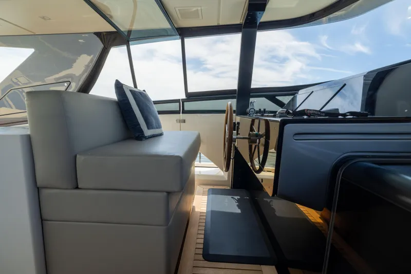 Sori San Lorenzo Yacht Photos Pics 2024 Sanlorenzo SL90A yacht helm with modern design and luxurious seating.