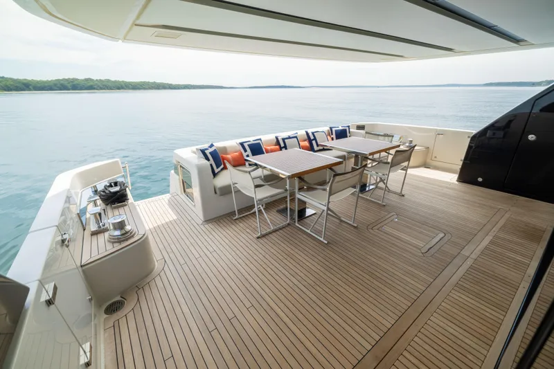 Sori San Lorenzo Yacht Photos Pics Luxurious 2024 Sanlorenzo SL90A yacht deck with elegant seating and ocean view.
