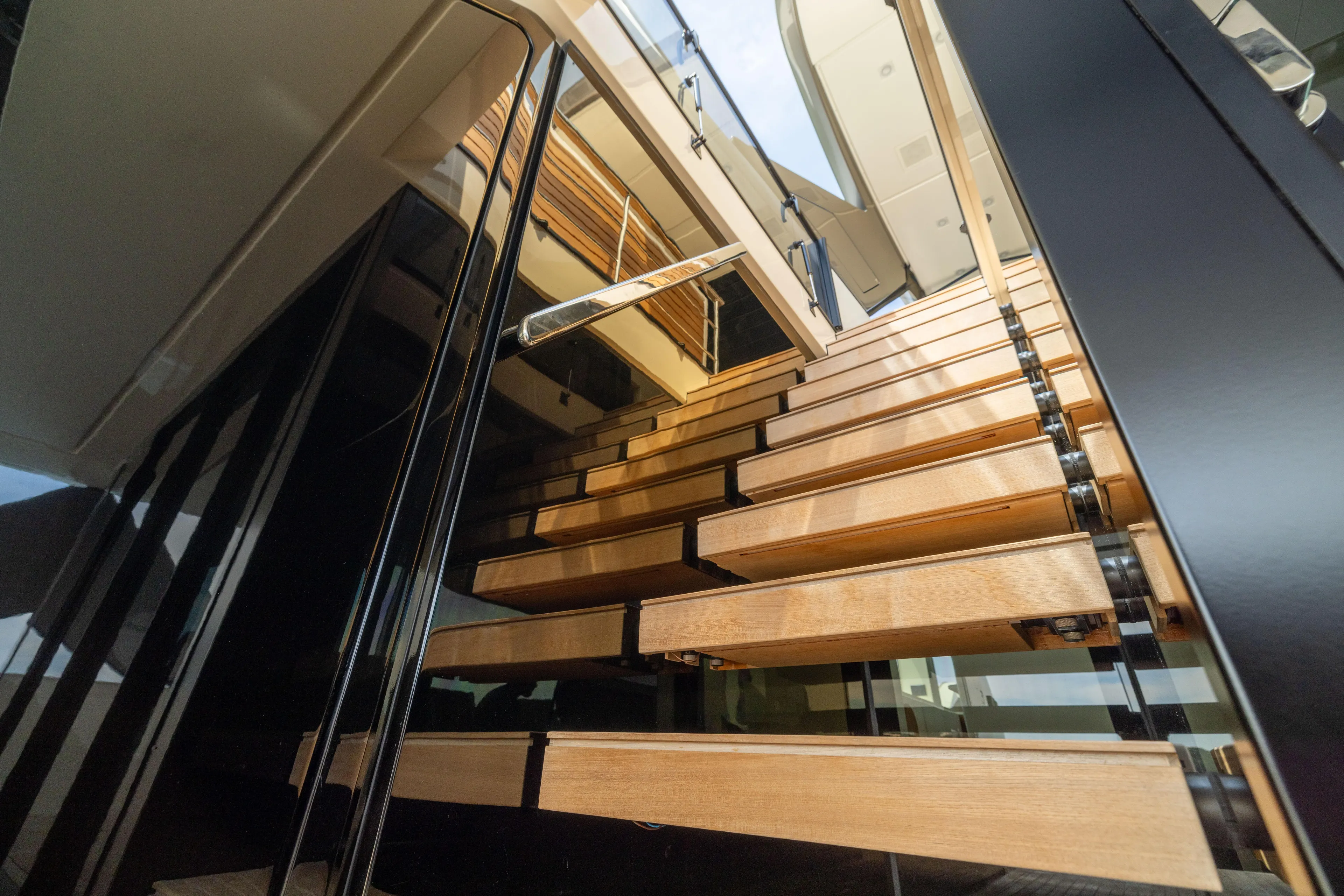 Sori San Lorenzo Yacht Photos Pics Staircase on 2024 Sanlorenzo SL90A yacht, featuring modern wooden steps and sleek design.