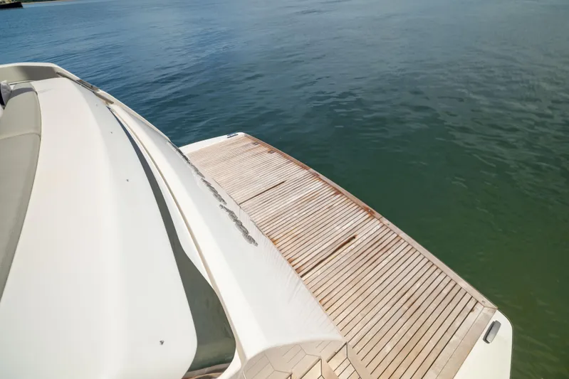 Sori San Lorenzo Yacht Photos Pics 2024 Sanlorenzo SL90A yacht with sleek deck design on calm water.