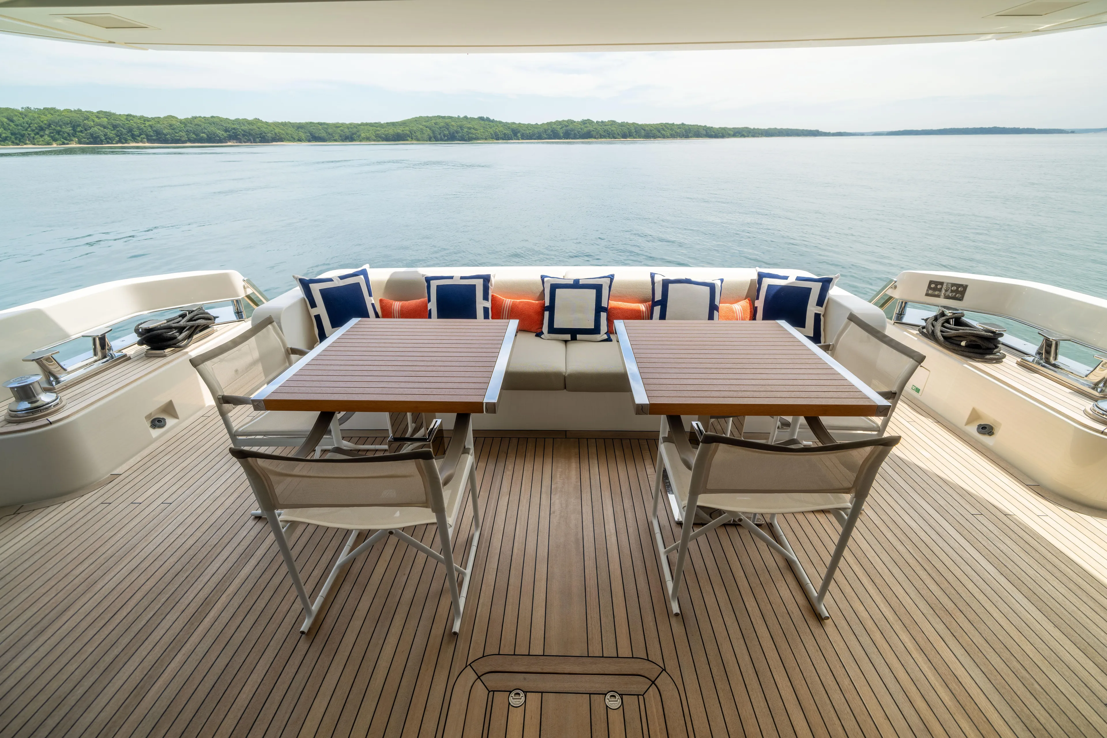 Sori San Lorenzo Yacht Photos Pics Luxury deck of 2024 Sanlorenzo SL90A yacht with elegant seating and ocean view.