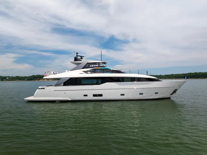 Sori San Lorenzo Yacht Photos Pics 2024 Sanlorenzo SL90A yacht on calm water under a partly cloudy sky.