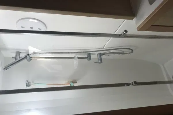 Zun Zun Yacht Photos Pics Shower area inside a 2014 Lagoon 39 yacht, featuring modern fixtures and sleek design.