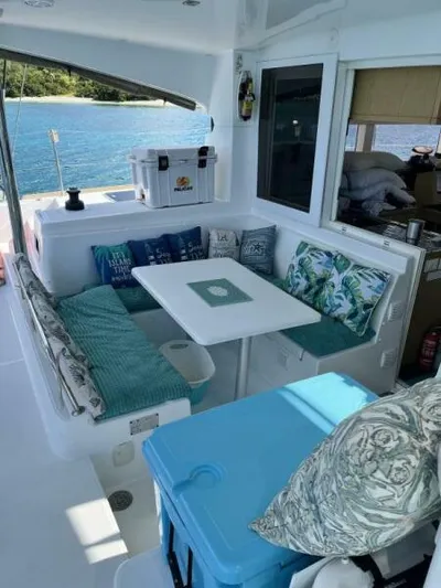 Zun Zun Yacht Photos Pics 2014 Lagoon 39 yacht interior with cozy seating and ocean view.