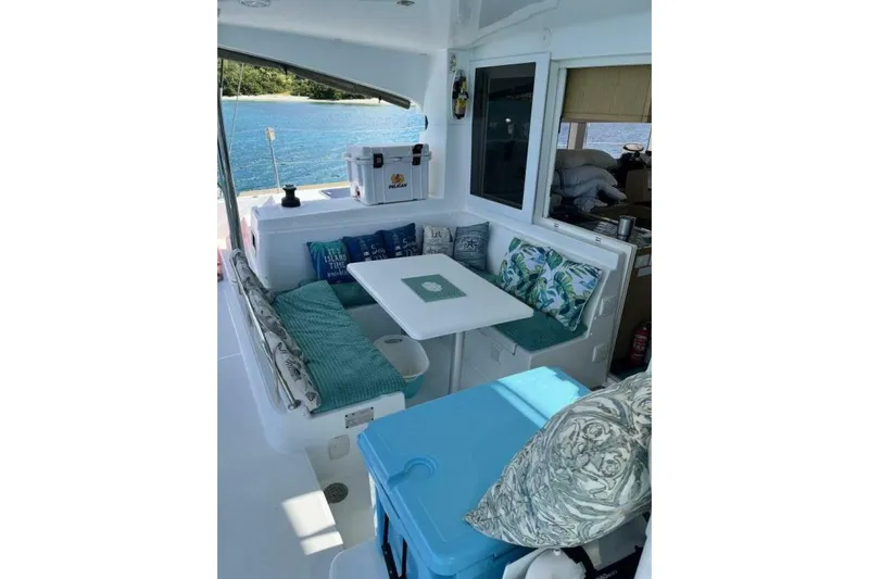 Zun Zun Yacht Photos Pics Cozy seating area on a 2014 Lagoon 39 catamaran with scenic ocean view.