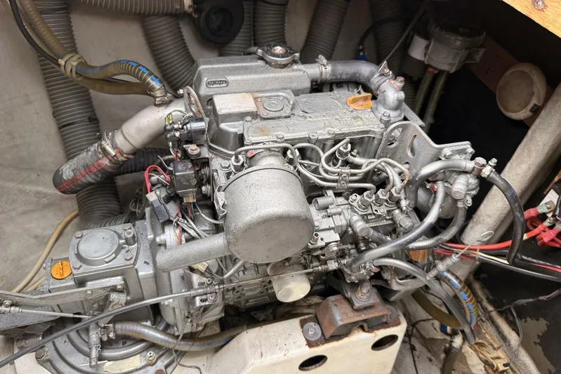 Zun Zun Yacht Photos Pics Engine compartment of a 2014 Lagoon 39 catamaran, showcasing detailed mechanical components.