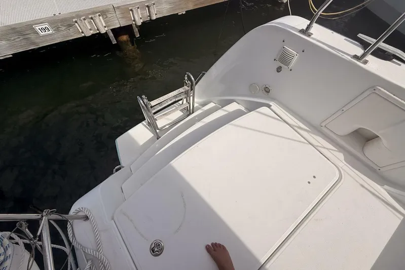 Zun Zun Yacht Photos Pics 2014 Lagoon 39 yacht stern with swim ladder and dock view.