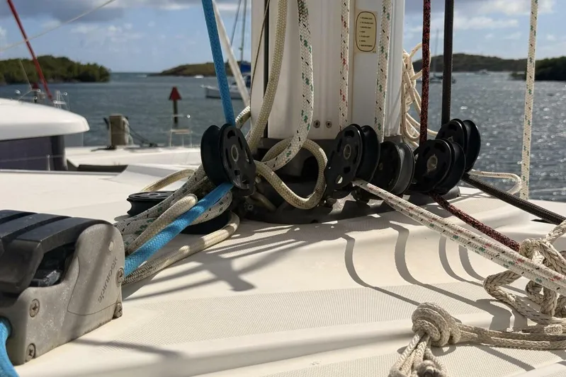 Zun Zun Yacht Photos Pics Close-up of rigging on a 2014 Lagoon 39 sailboat, with scenic water backdrop.