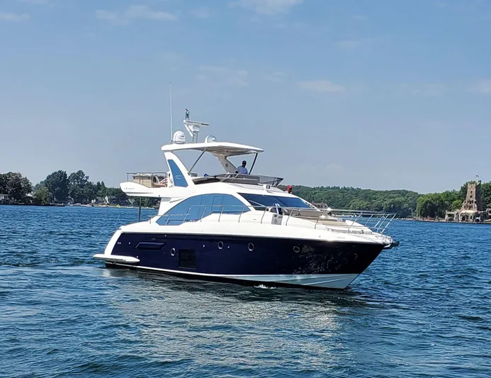  Yacht Photos Pics 2018 Azimut 50 Flybridge yacht cruising on a sunny day.