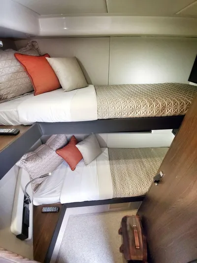  Yacht Photos Pics Cozy twin cabin in 2018 Azimut 50 Flybridge yacht with modern decor.