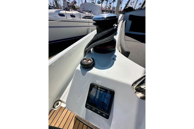 Best Day Ever Yacht Photos Pics Jeanneau Sun Odyssey 410 sailboat deck with winch and navigation display, 2022 model.