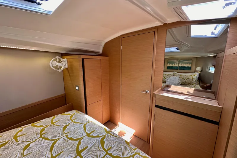 Best Day Ever Yacht Photos Pics Interior of 2022 Jeanneau Sun Odyssey 410 yacht, featuring cozy cabin and modern design.