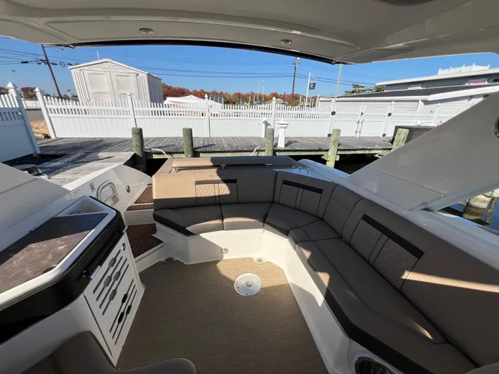 Knot On Call Yacht Photos Pics 2018 Sea Ray 310 SLX boat interior with spacious seating and modern design.