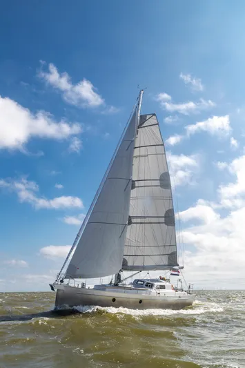 Bv3 Yacht Photos Pics Sailing yacht Bestevaer 36, 2023 model, gliding on open sea under clear blue sky.