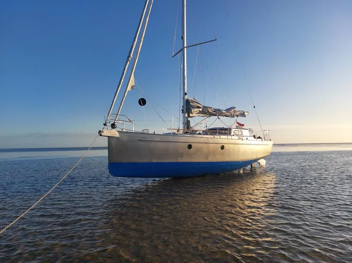Bv3 Yacht Photos Pics Sailing yacht Bestevaer 36, 2023 model, anchored in shallow water at sunset.