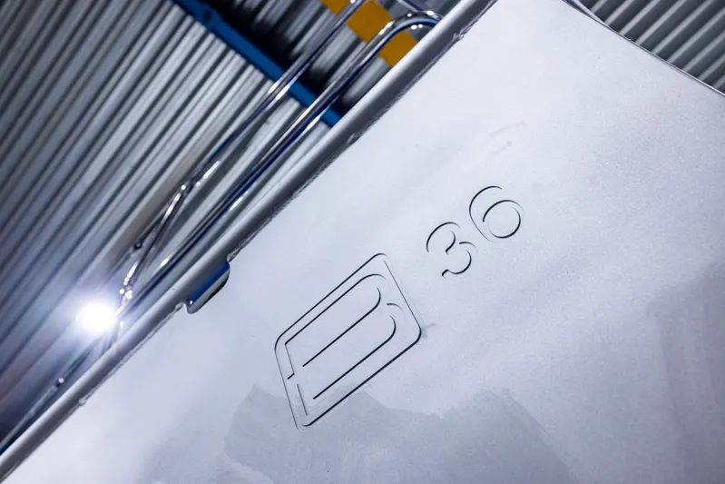 Bv3 Yacht Photos Pics Bestevaer 36 yacht, 2023 model, close-up of logo and sleek design.