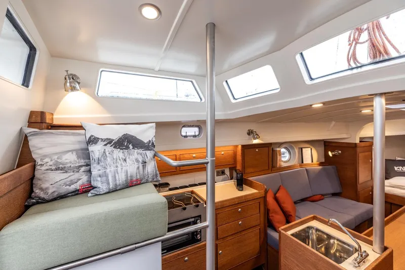 Bv3 Yacht Photos Pics Interior of 2023 Bestevaer 36 yacht with modern design and cozy seating area.