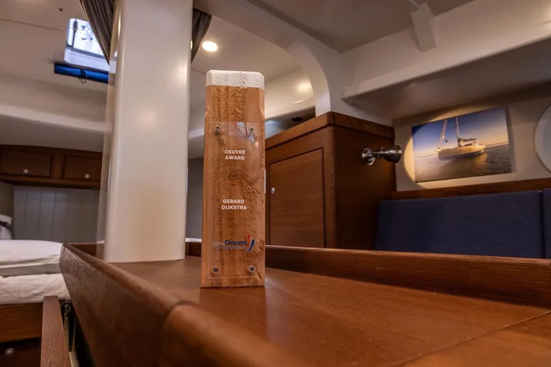 Bv3 Yacht Photos Pics Interior of 2023 Bestevaer 36 yacht with award on wooden table.