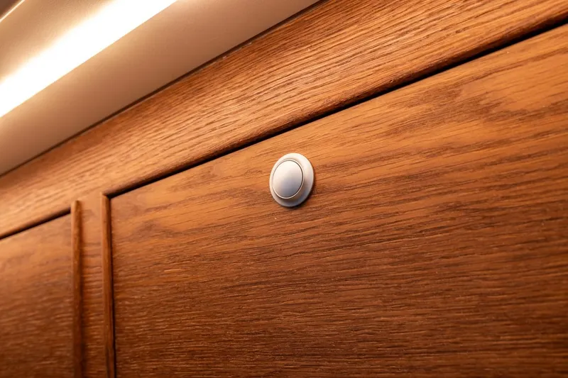Bv3 Yacht Photos Pics Wooden cabinet detail with a round metal button, Bestevaer 36, 2023 model.