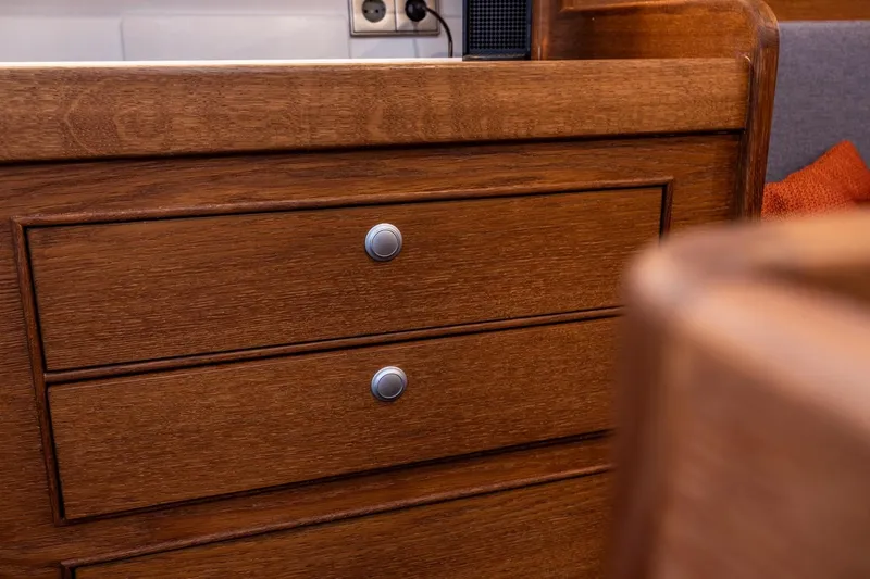 Bv3 Yacht Photos Pics Wooden drawers in a 2023 Bestevaer 36 yacht interior, featuring sleek metal knobs.
