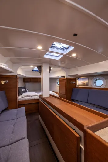 Bv3 Yacht Photos Pics Interior of 2023 Bestevaer 36 yacht, featuring cozy seating and elegant wood finishes.