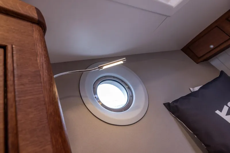 Bv3 Yacht Photos Pics Cozy interior of 2023 Bestevaer 36 yacht with porthole and reading light.