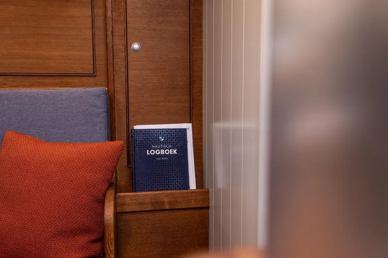 Bv3 Yacht Photos Pics Logbook in wooden interior of 2023 Bestevaer 36 yacht, with cushions.