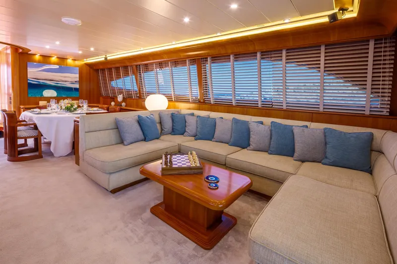  Yacht Photos Pics Luxurious interior of 2003 Canados 86 yacht with plush seating and elegant decor.