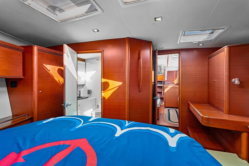 La Chiricana Yacht Photos Pics Luxurious interior of 2011 Dufour 525 Grand Large yacht with wood finish and modern amenities.