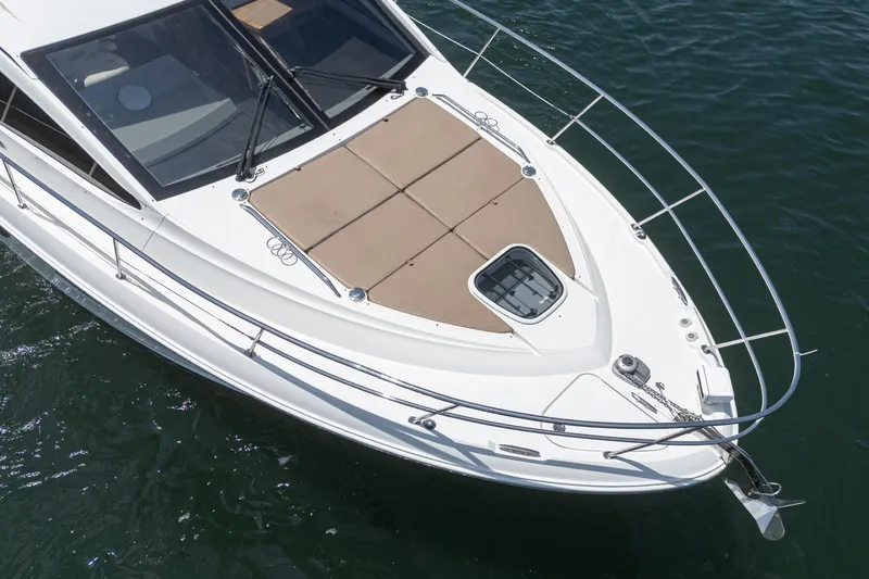  Yacht Photos Pics 2017 Sea Ray Sundancer 400 yacht, aerial view of bow with sunpad and railing.