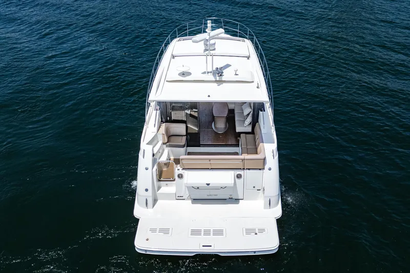  Yacht Photos Pics 2017 Sea Ray Sundancer 400 yacht on open water, rear view.