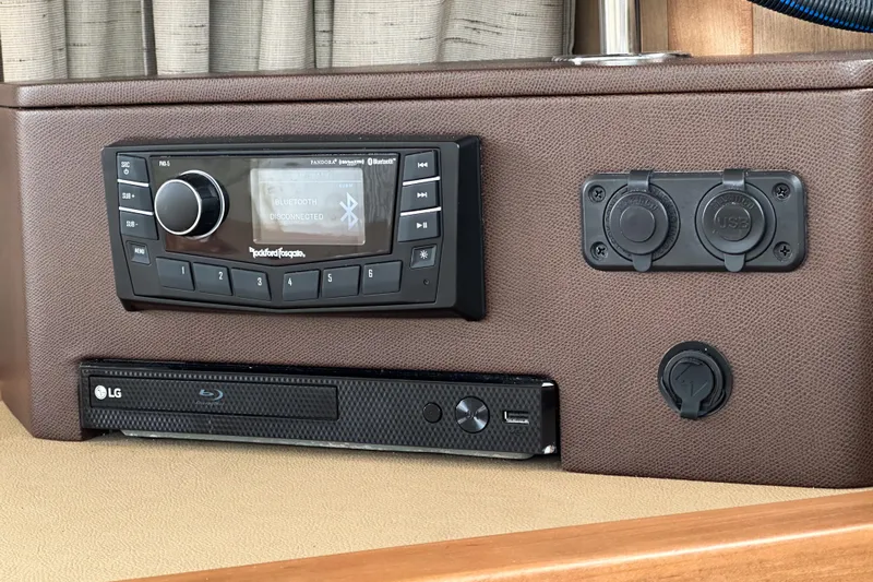  Yacht Photos Pics Audio system and Blu-ray player in 2017 Sea Ray Sundancer 400 yacht interior.