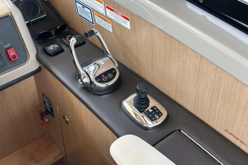  Yacht Photos Pics Control panel of 2017 Sea Ray Sundancer 400 yacht with throttle and joystick.