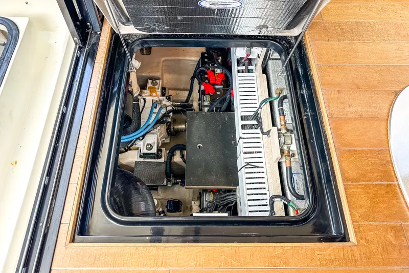  Yacht Photos Pics Engine compartment of 2017 Sea Ray Sundancer 400 yacht, showcasing mechanical components and wiring.