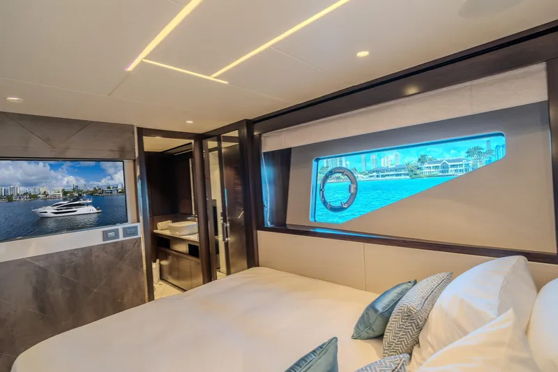 Ramaya 4 Yacht Photos Pics Luxurious interior of 2023 Sunseeker 88 Yacht with scenic window view.