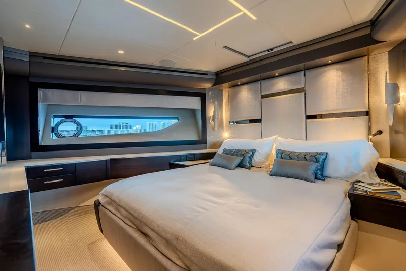Ramaya 4 Yacht Photos Pics Luxurious bedroom interior of 2023 Sunseeker 88 Yacht with modern design and city view.