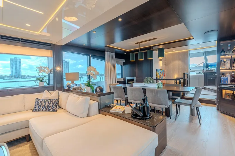 Ramaya 4 Yacht Photos Pics Luxurious interior of 2023 Sunseeker 88 Yacht with elegant furnishings and panoramic windows.