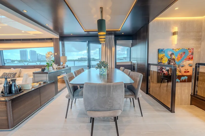 Ramaya 4 Yacht Photos Pics Luxurious interior of 2023 Sunseeker 88 Yacht with elegant dining area and modern decor.