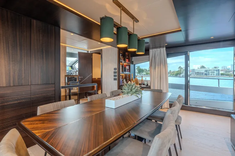 Ramaya 4 Yacht Photos Pics Luxurious interior of 2023 Sunseeker 88 Yacht with elegant dining area and scenic views.